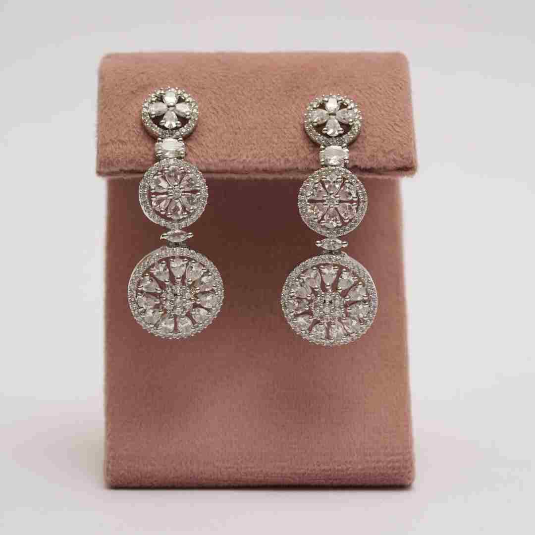 Silver triple round diamond cocktail earrings